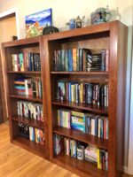 Cherry wood brings a warm look to these bookcases.